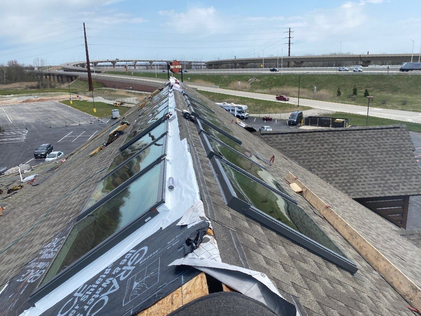 Green Bay WI Commercial roof replacement by roofer Badgerland Restoration & Remodeling GAF Timberland HDZ Weathered Wood