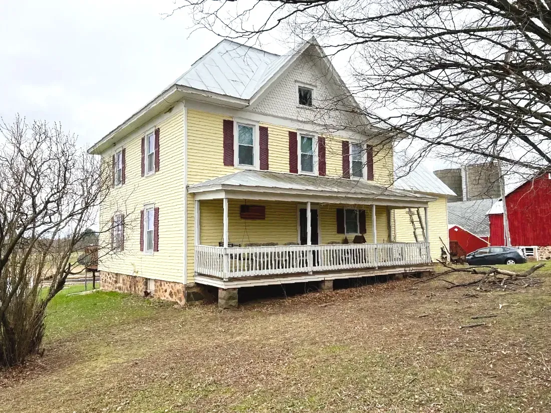 Residential Hail Damage Metal roof and siding replacement by roofing contractor Badgerland Restoration & Remodeling