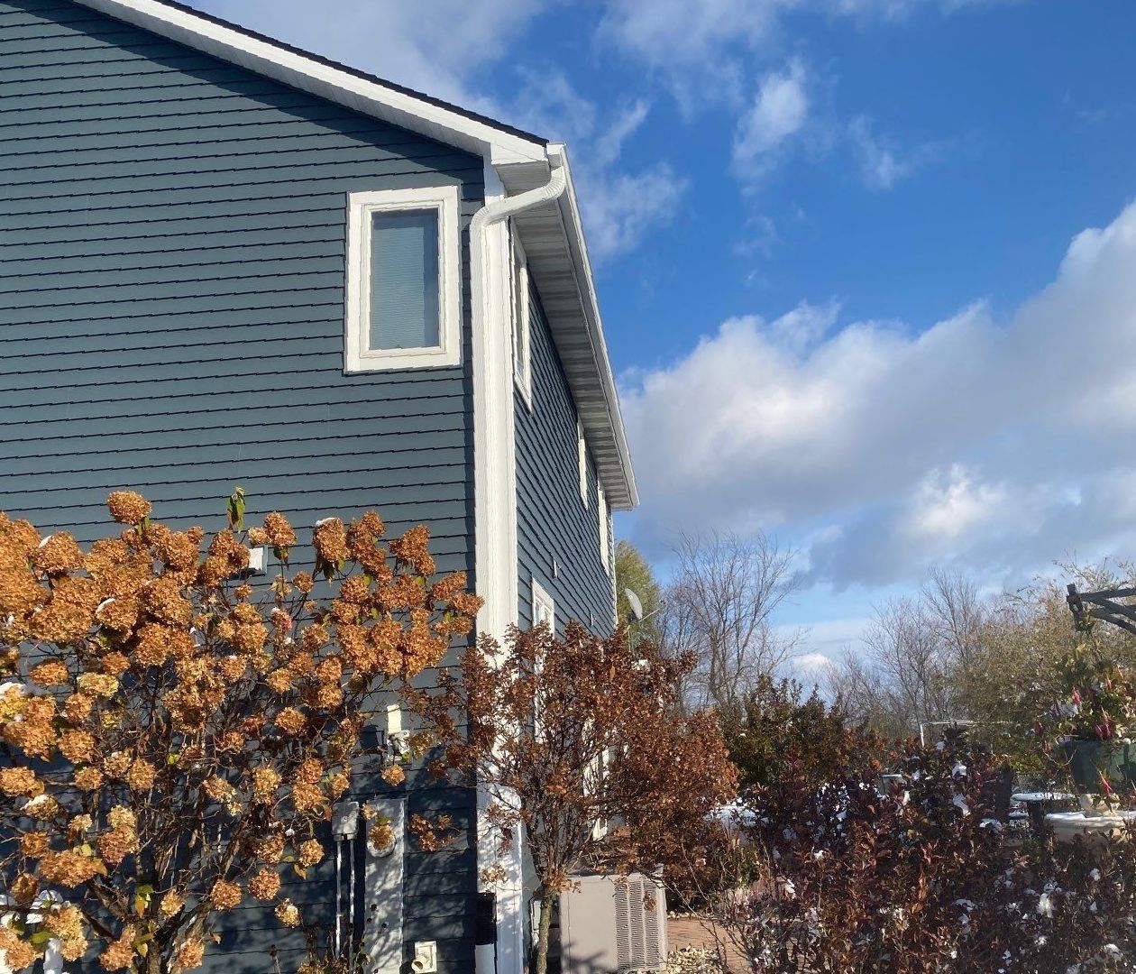 Badgerland Restoration & Remodeling residential general contractor Weyauwega Wisconsin siding replacement after photo