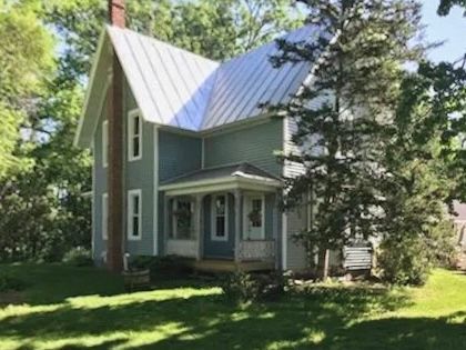 Siding, Windows, Soffit, Fascia & Deck Replacements in WILD ROSE WI by contractor Badgerland Restoration & Remodeling Inc.