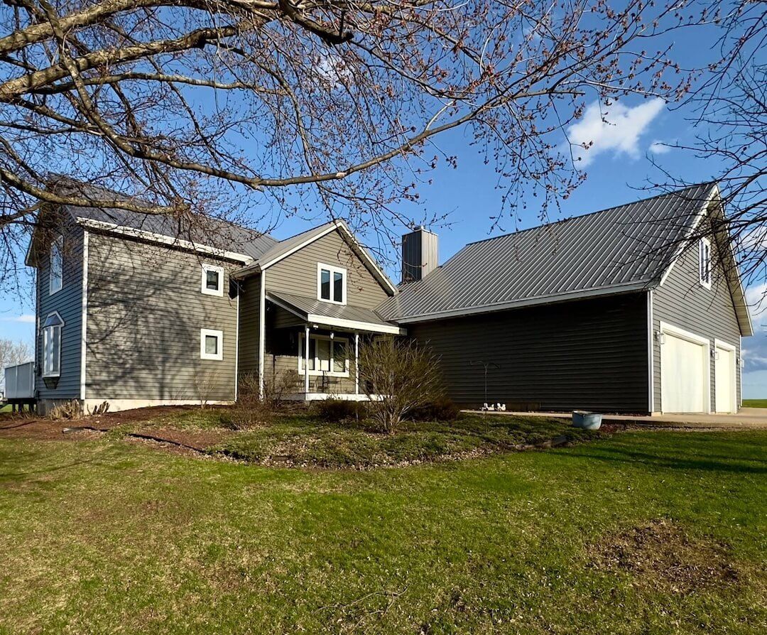 Badgerland Restoration & Remodeling residential general contractor Weyauwega Wisconsin siding replacement after photo 