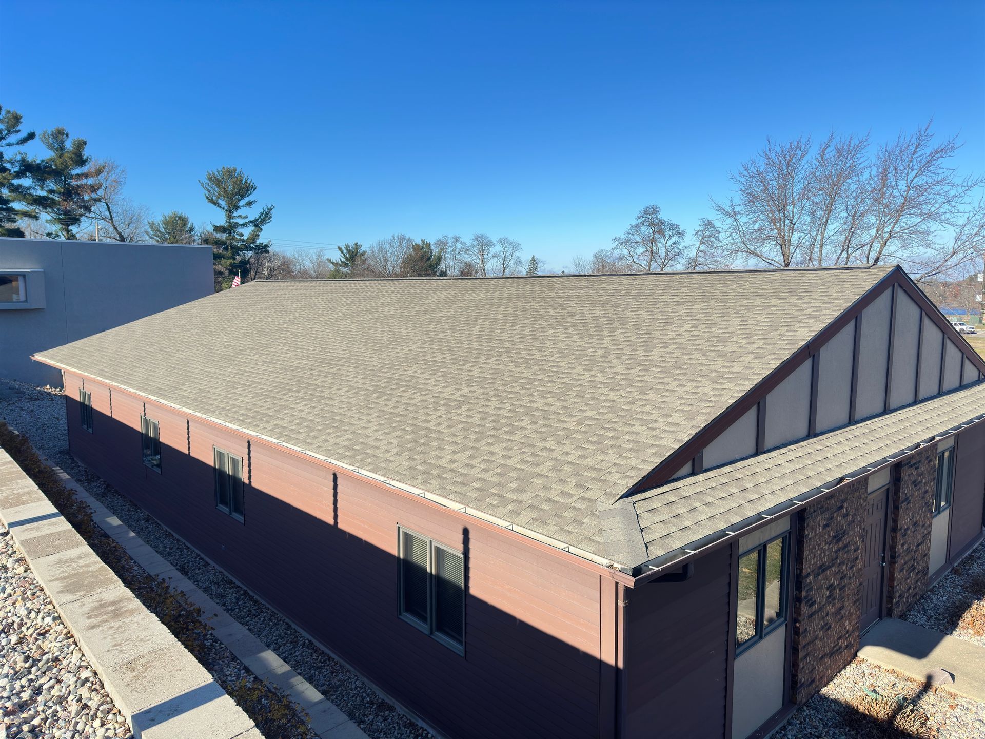 Commercial Property Insurance claim hail damage roof replacement in Wisconsin Rapids WI GAF Timberline HDZ Pewter Gray