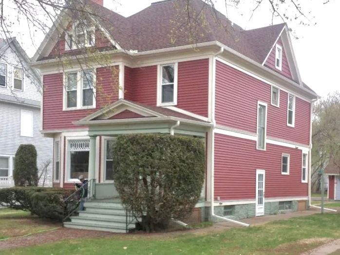 Full Exterior Renovation - WINDOW INSTILLATION - DUTCH LAP VINYL SIDING by contractor Badgerland Restoration & Remodeling