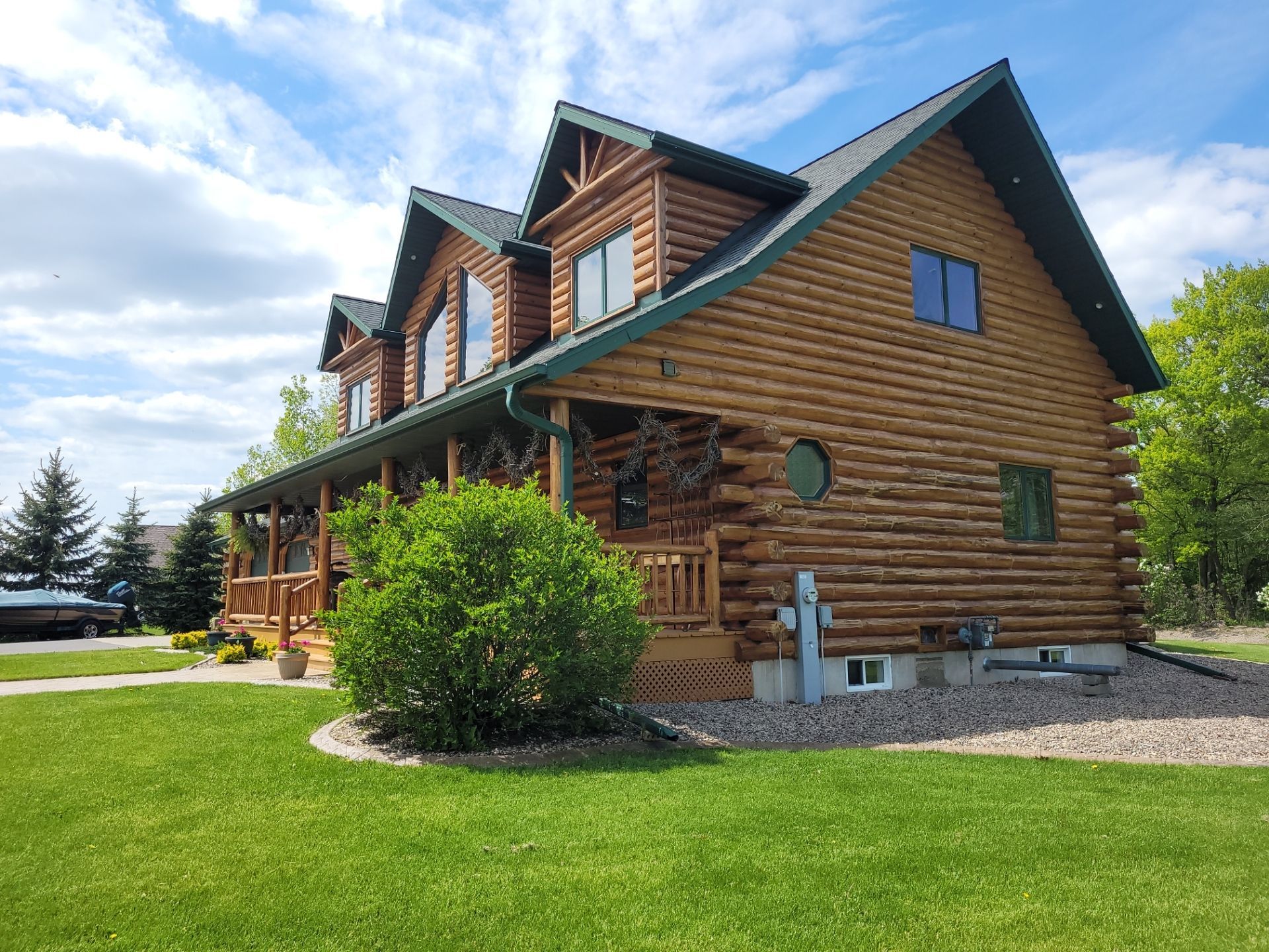 Residential Shingled Roof Replacement, GAF Timberline HDZ Hunter Green 2024 Roofer in New London WI before & after gallery