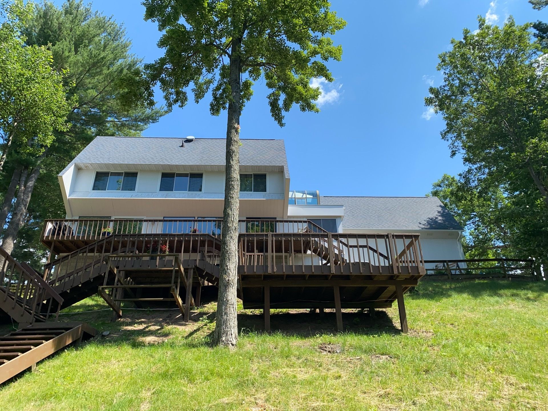 Badgerland Restoration & Remodeling residential storm contractor Wisconsin Rapids WI roof replacement before & after photo