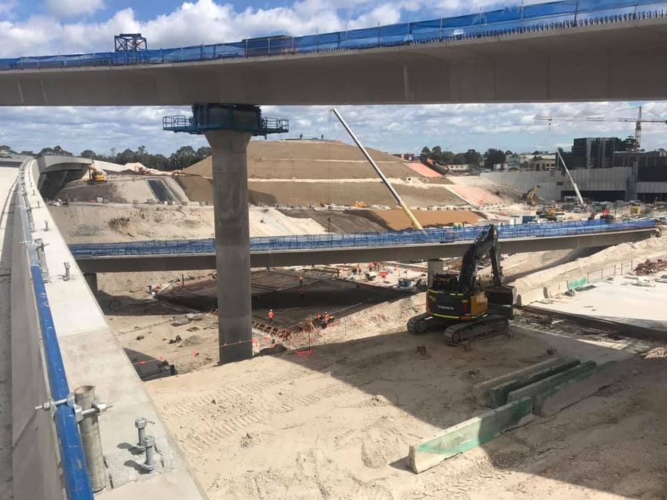 A Construction Site With A Bridge In The Background — Primmer Steel In Nabiac, NSW