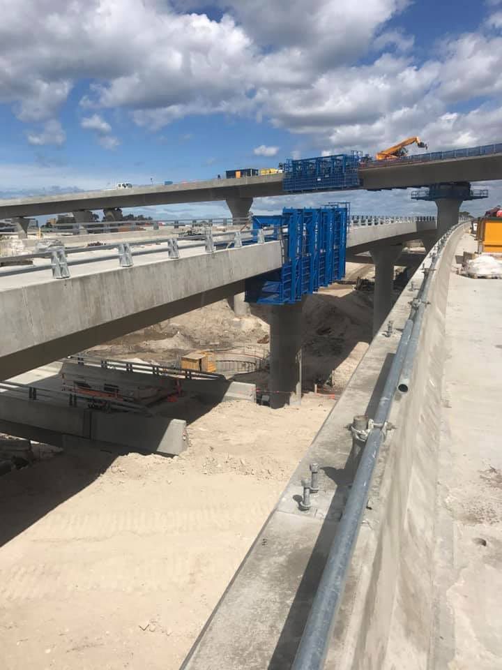 A Bridge Is Being Built Over A River — Primmer Steel In Nabiac, NSW