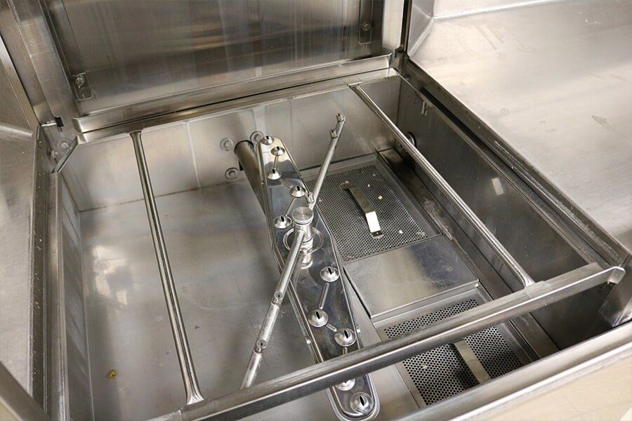 A dishwasher in a commercial kitchen in Coffs Harbour