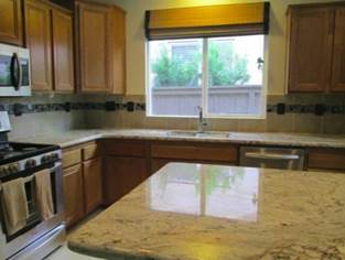 Affordable Laminate Flooring — White and Black Stone Countertops in Banning, CA