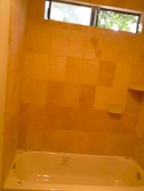 Affordable Tile Flooring — Inside Bathroom with Backsplash in Banning, CA