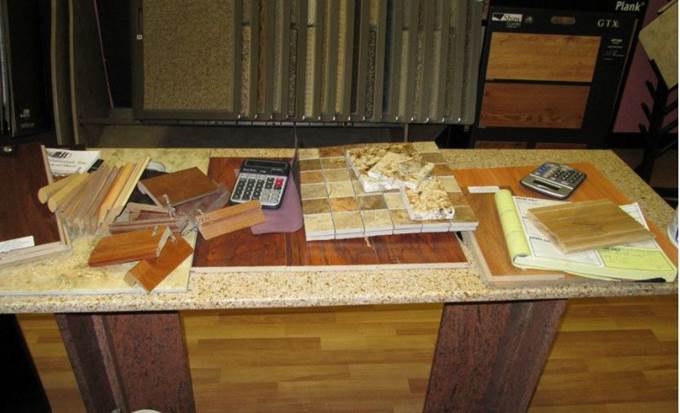 Stone Flooring — Desk with Tile Samples in Banning, CA