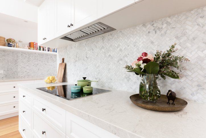 Quality Countertops — White Kitchen Countertop and Backsplash in Banning, CA