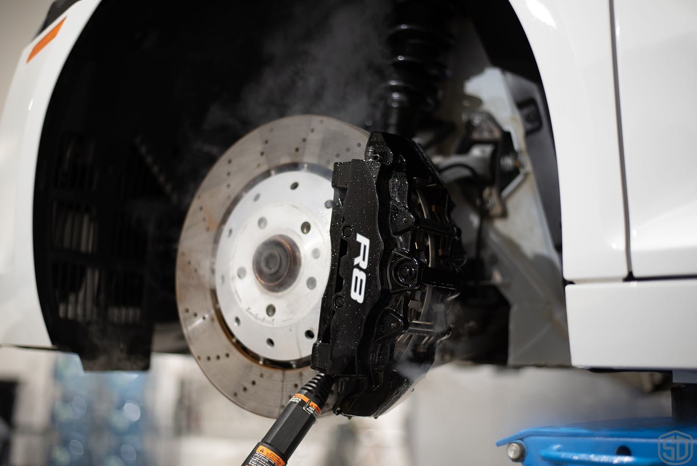 2009 Audi R8 wheel caliper and suspension fully detailed close up