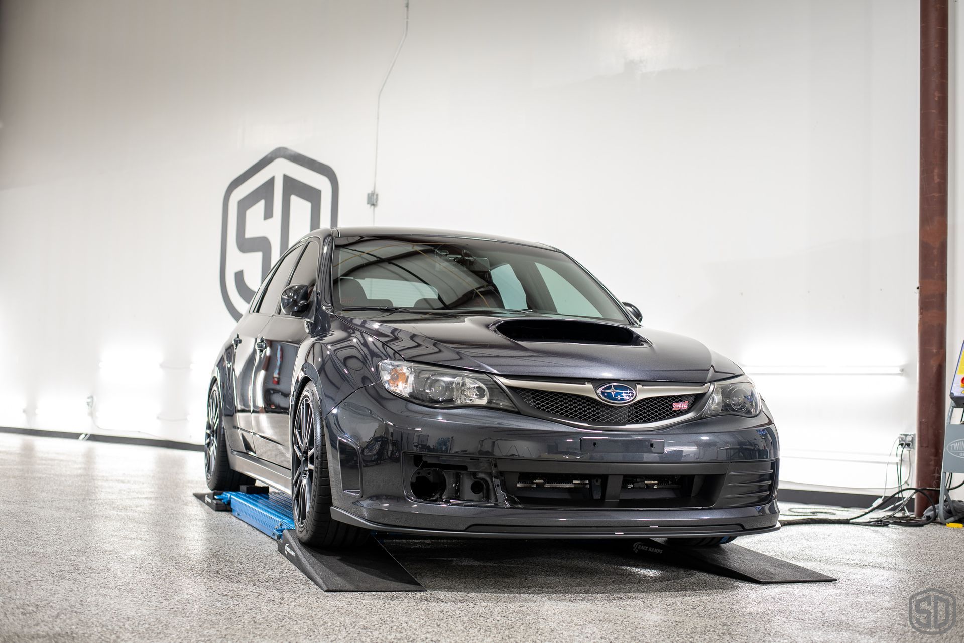 2010 Subaru WRX STI Signature Suspension Detail - wheels, suspension, and brake calipers Orlando Florida USA