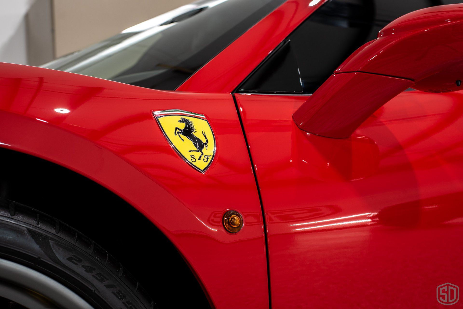 2016 Ferrari 488 Spyder Wheels off Detail, Paint Correction, Modesta Primer Polish and Wheel and Caliper Protection with a Ceramic Coating emblem close up Orlando