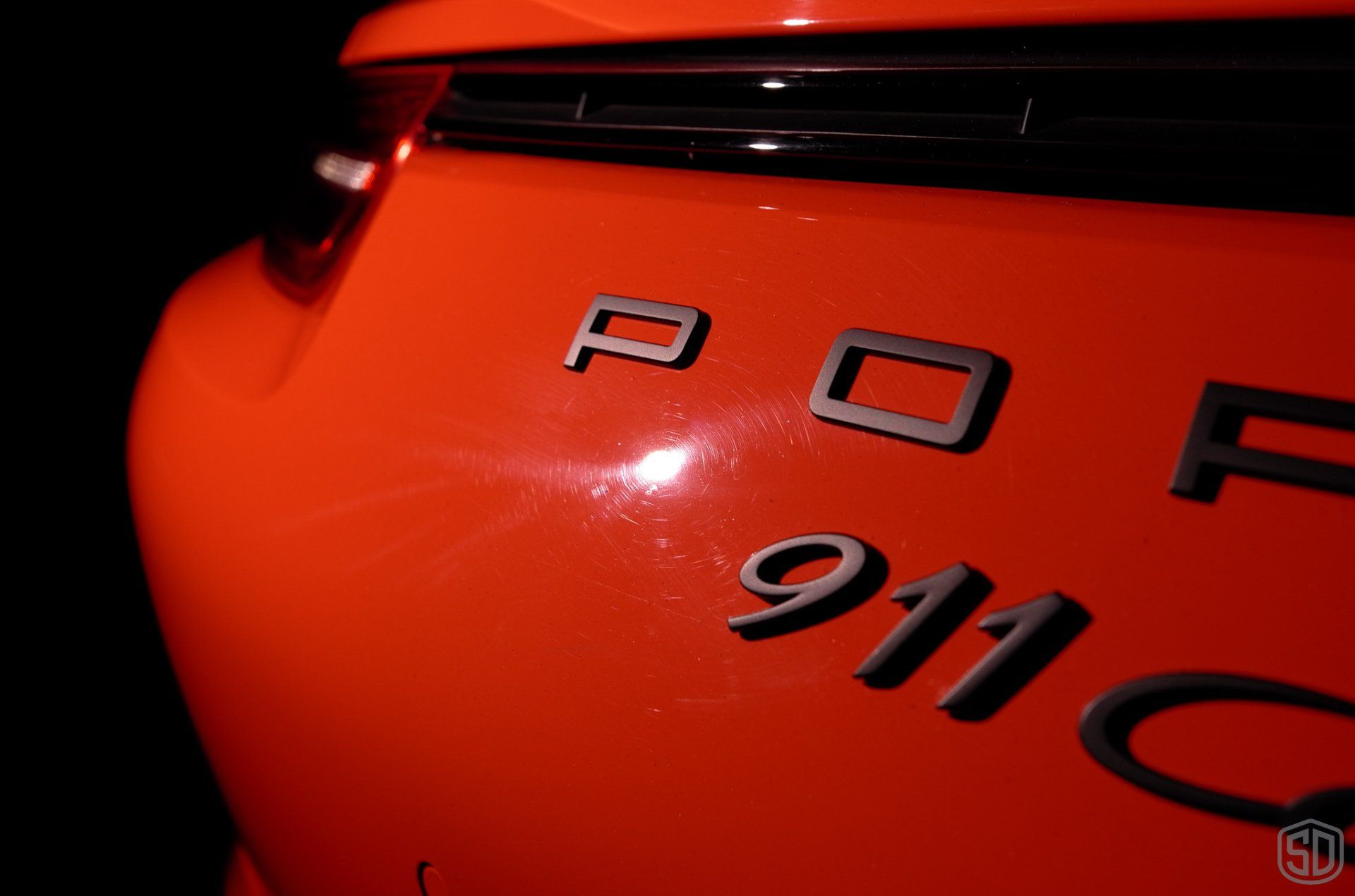 2016 Porsche 911 GTS Detailing, Paint Correction, Paint Chip Repair, Nano-Titanium Glass Coating, Paint Protection Film rear badge close up Florida USA