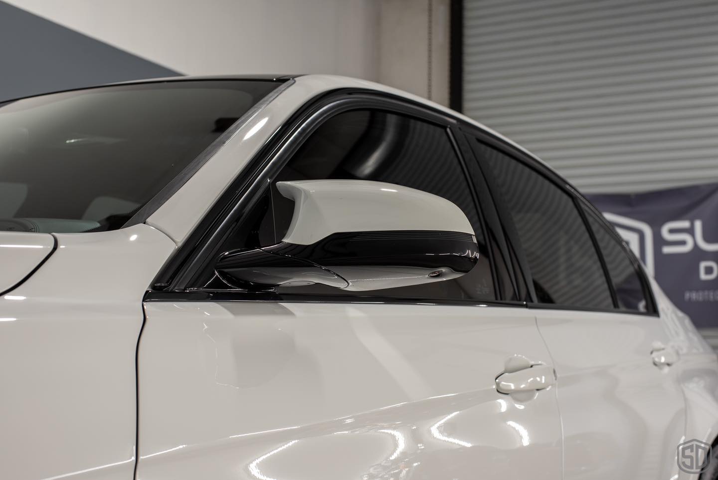 2018 BMW M3 Detailing and Paint Protection Film Round 2 side mirror close up Orlando, FL