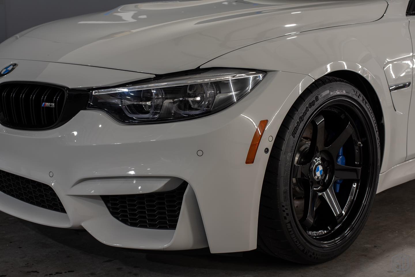 2018 BMW M3 Detailing and Paint Protection Film Round 2 front headlight close upOrlando, FL
