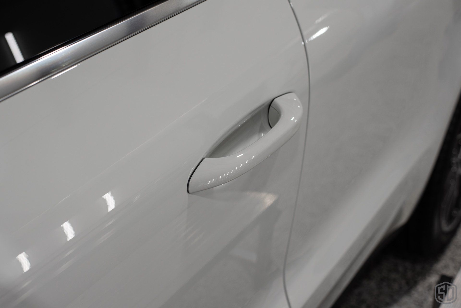 2019 Porsche Macan high end detailing Modesta BC-06 water repellent glass coating door close up Orlando Florida