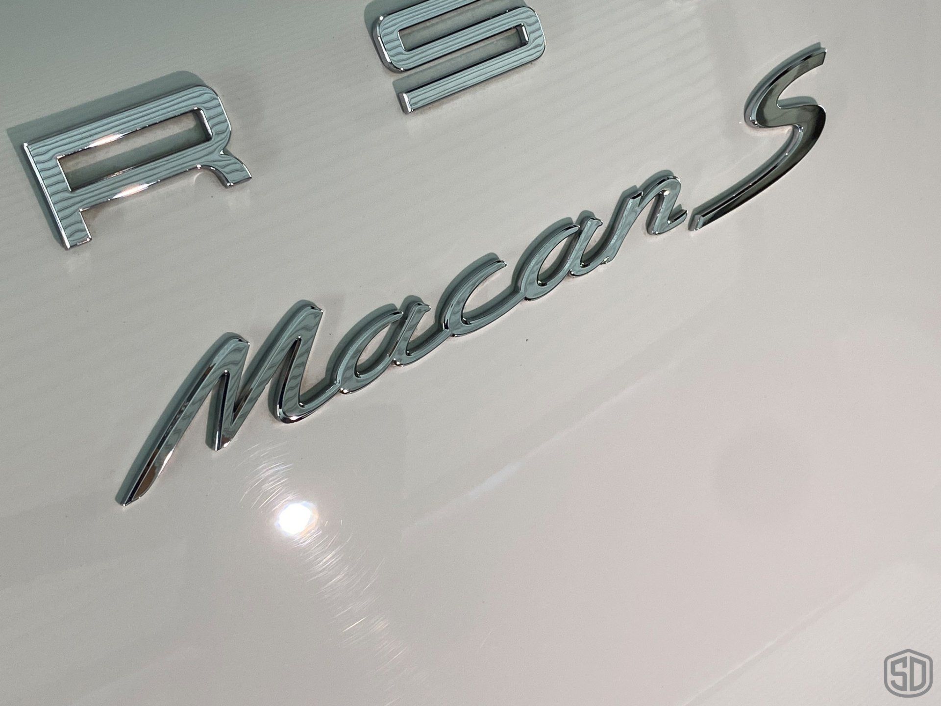 2019 Porsche Macan high end detailing Modesta BC-06 water repellent glass coating rear emblem close up  Orlando Florida