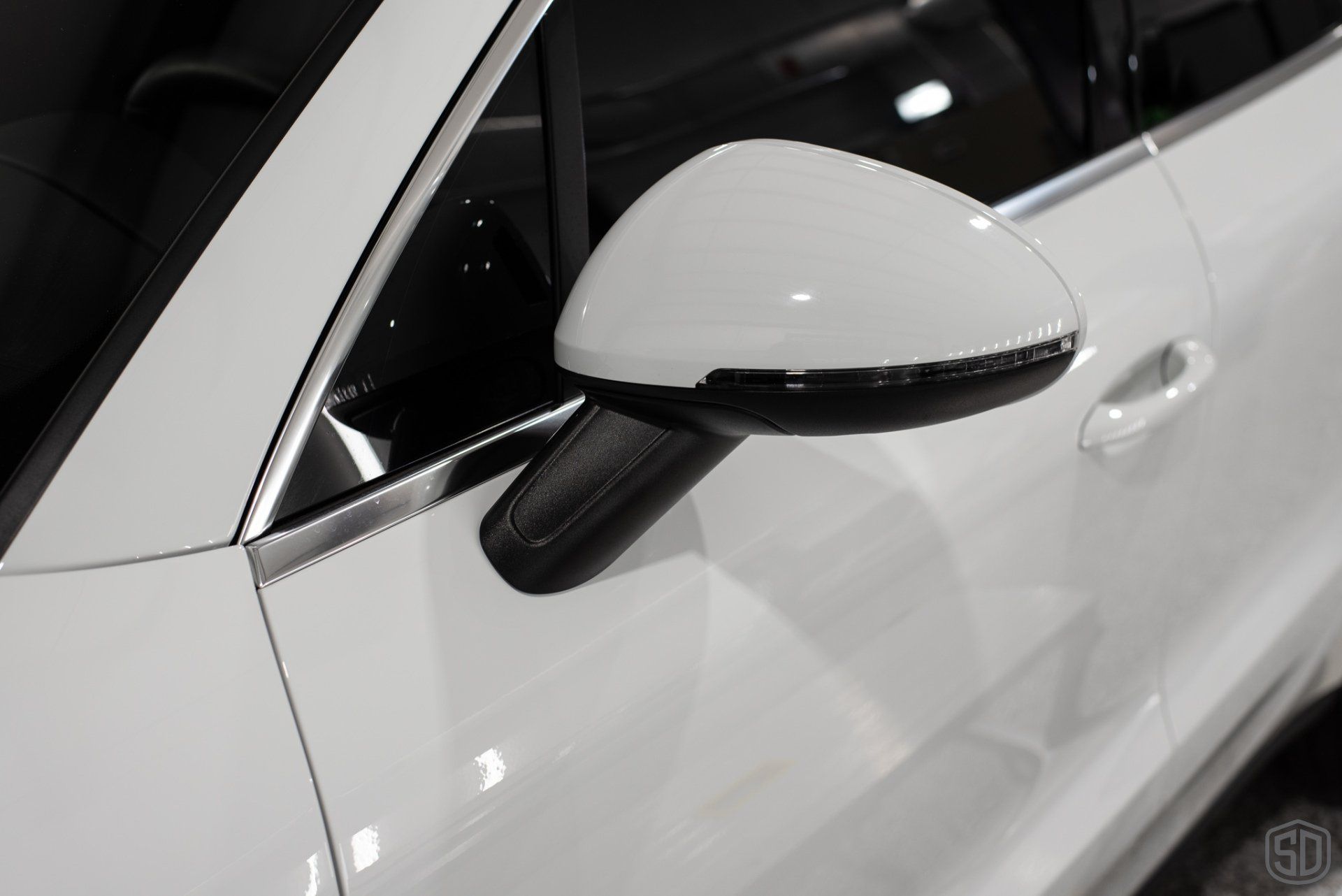 2019 Porsche Macan high end detailing Modesta BC-06 water repellent glass coating and Modesta Heat resistant coating for wheels and calipers rear view mirror close up Orlando Florida