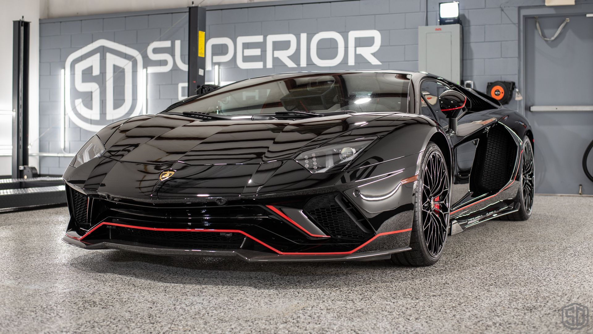 2022 Lamborghini Aventador Ultimae Detailing, Paint Correction, Engine and Interior Detailing, Paint Protection Film, Modesta Wheel and Glass Coating, Full Exterior Glass Protection front end view Orlando USA