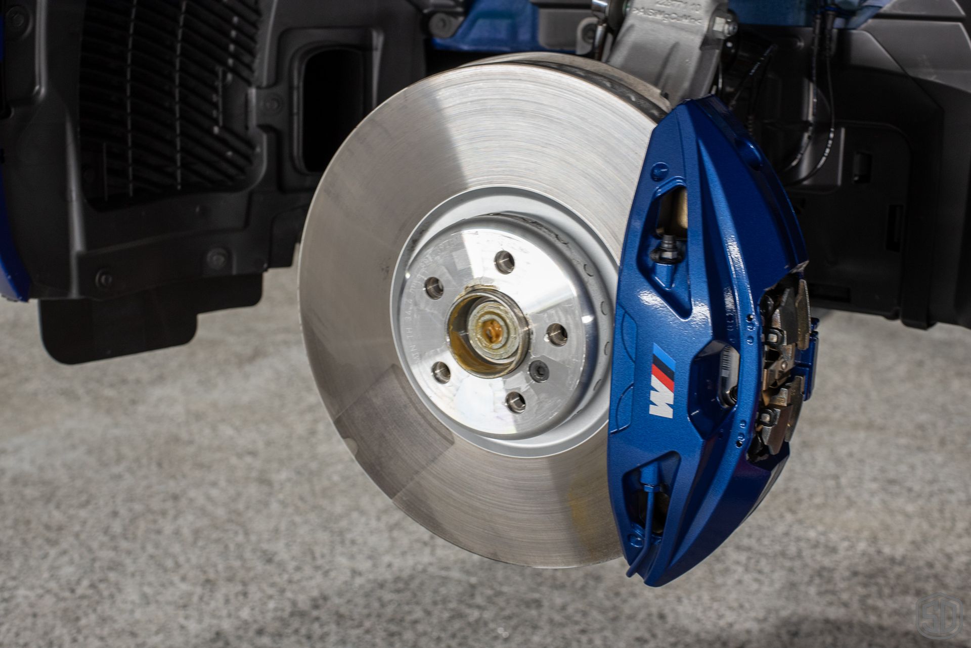 2023 BMW X5 M50i Paint Protection Film and Modesta Matte Coating BC-M and Brake Calipers and Wheels with BC-06 close up of caliper Florida USA