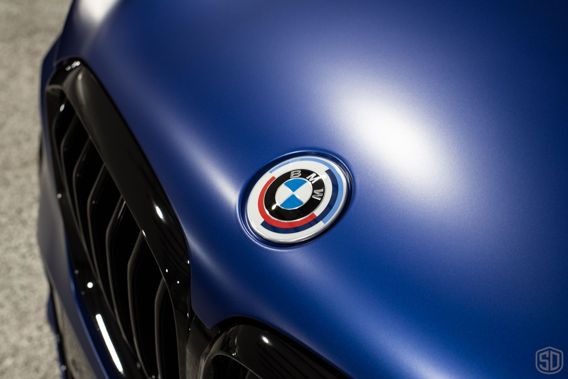 2023 BMW X5 M50i Paint Protection Film and Modesta Matte Coating BC-M and Brake Calipers and Wheels with BC-06 hood emblem view Florida USA