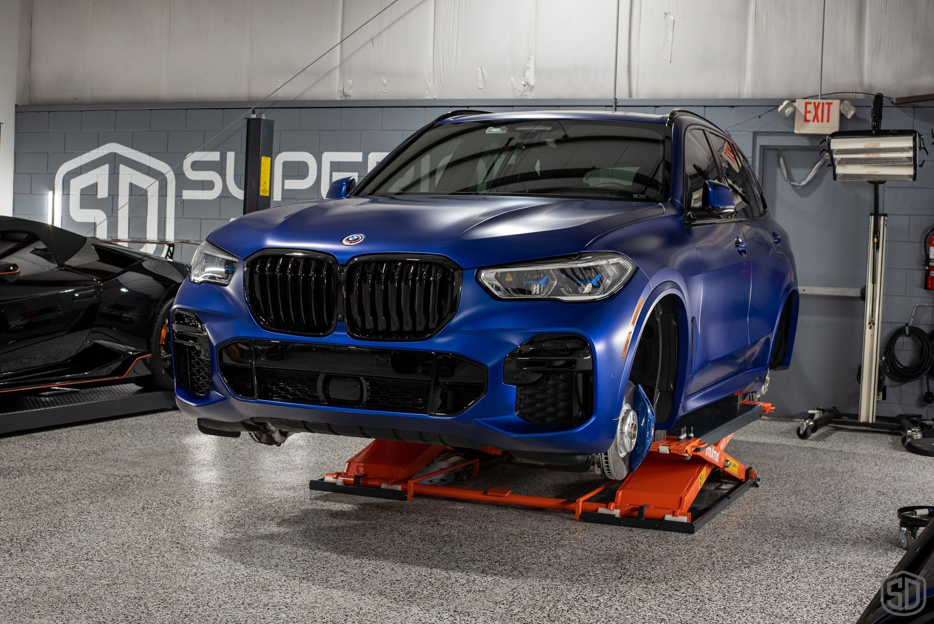 2023 BMW X5 M50i Paint Protection Film and Modesta Matte Coating BC-M and Brake Calipers and Wheels with BC-06 wheels off Florida