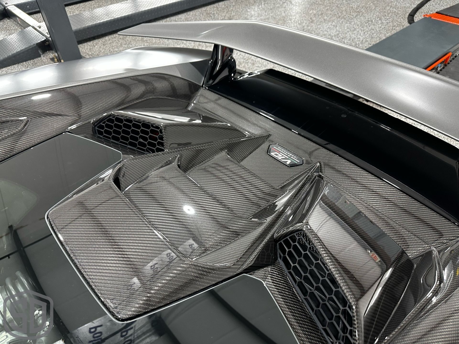 A close up of a car with a spoiler on top of it