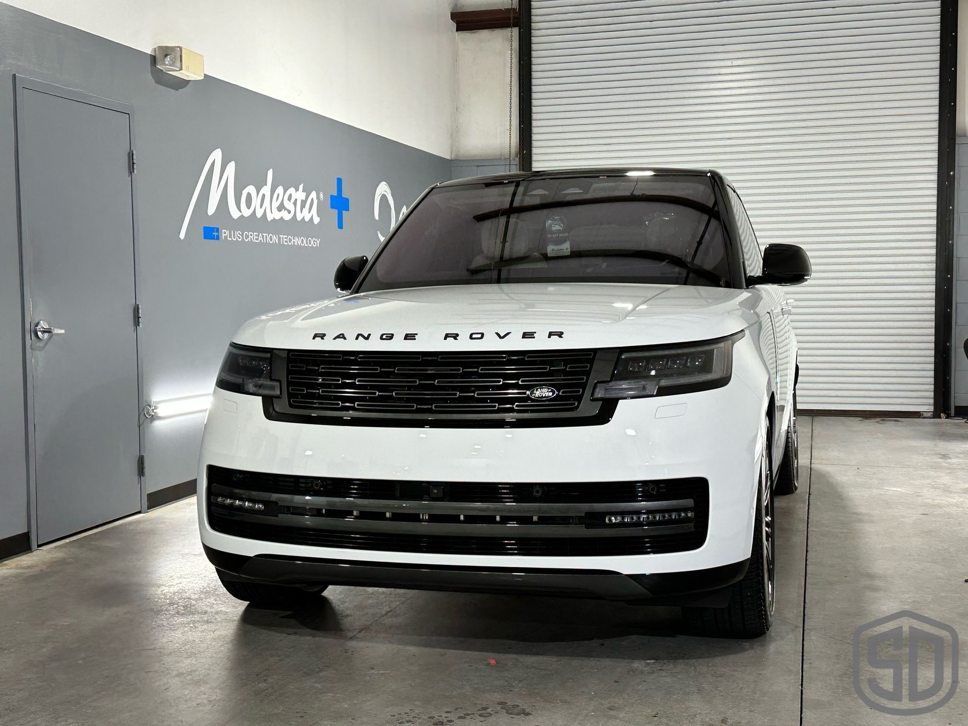 2023 Land Rover Range Rover Autobiography Detailing, Suntek Paint Protection Film, Ceramic Window Film, Modesta BC-06 Top Coat, Exterior Glass Coating, and BC-04 Nano-Titanium Coating front end view Orlando