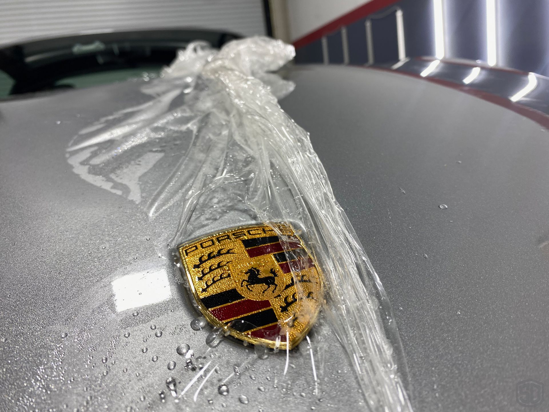 2023 Porsche Targa 4 GTS and 2019 718 Boxster GTS Modesta Coatings and Premium Detail Service hood emblem close up Orlando, Florida