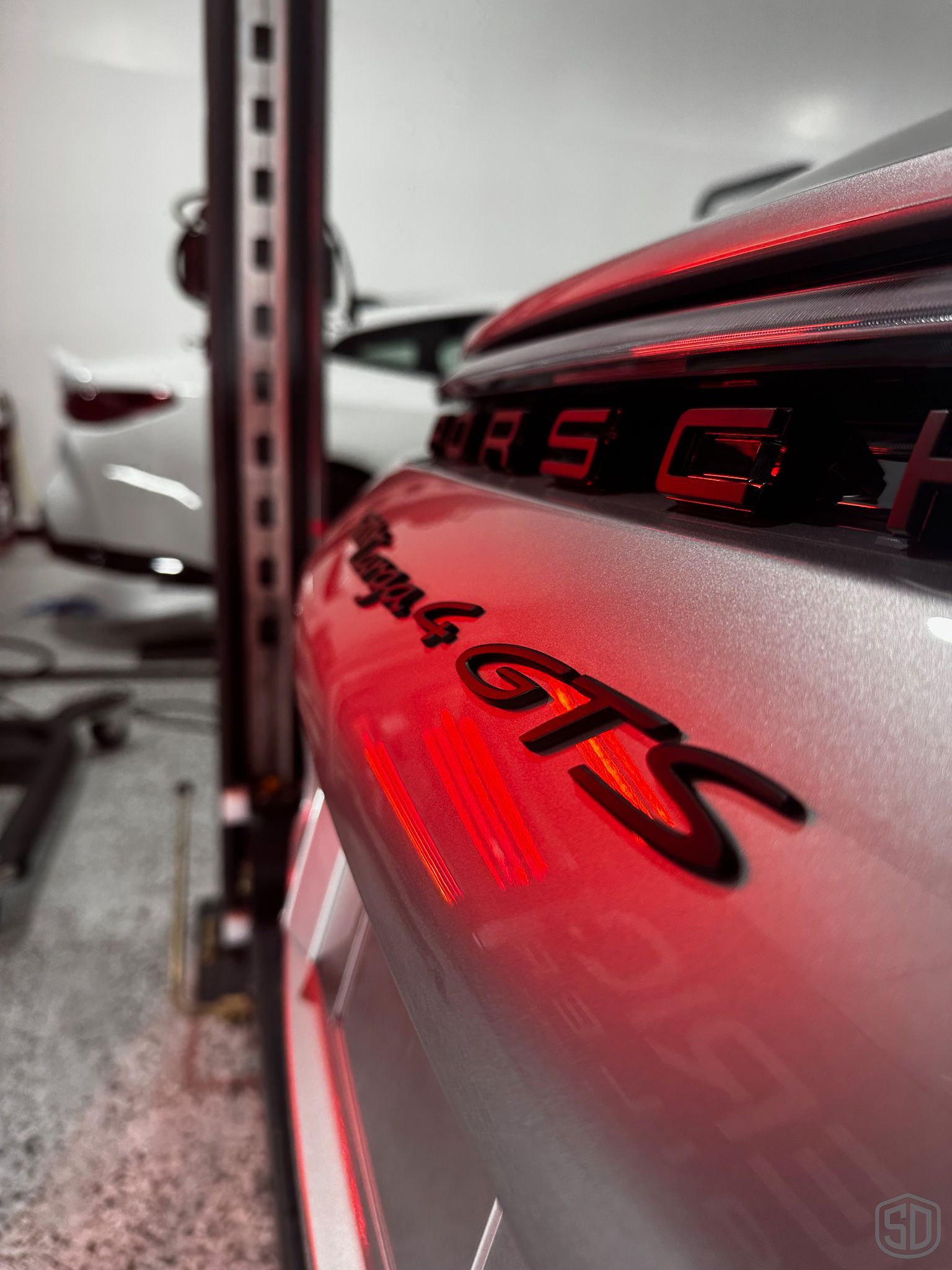 2023 Porsche Targa 4 GTS and 2019 718 Boxster GTS Modesta Coatings and Premium Detail Service rear emblem close up Orlando, FL