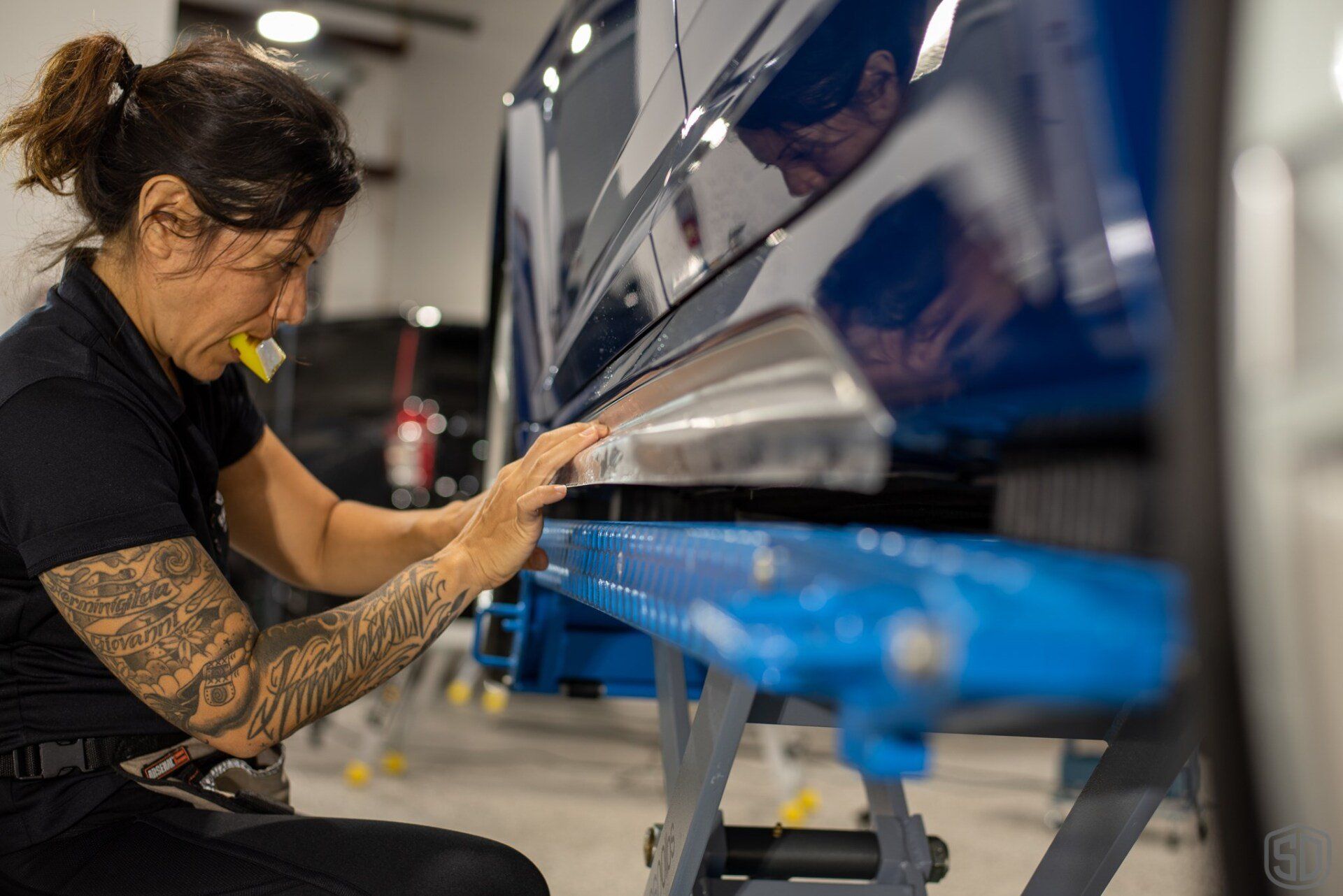 Installing Paint Protection Film on side skirts in Orlando