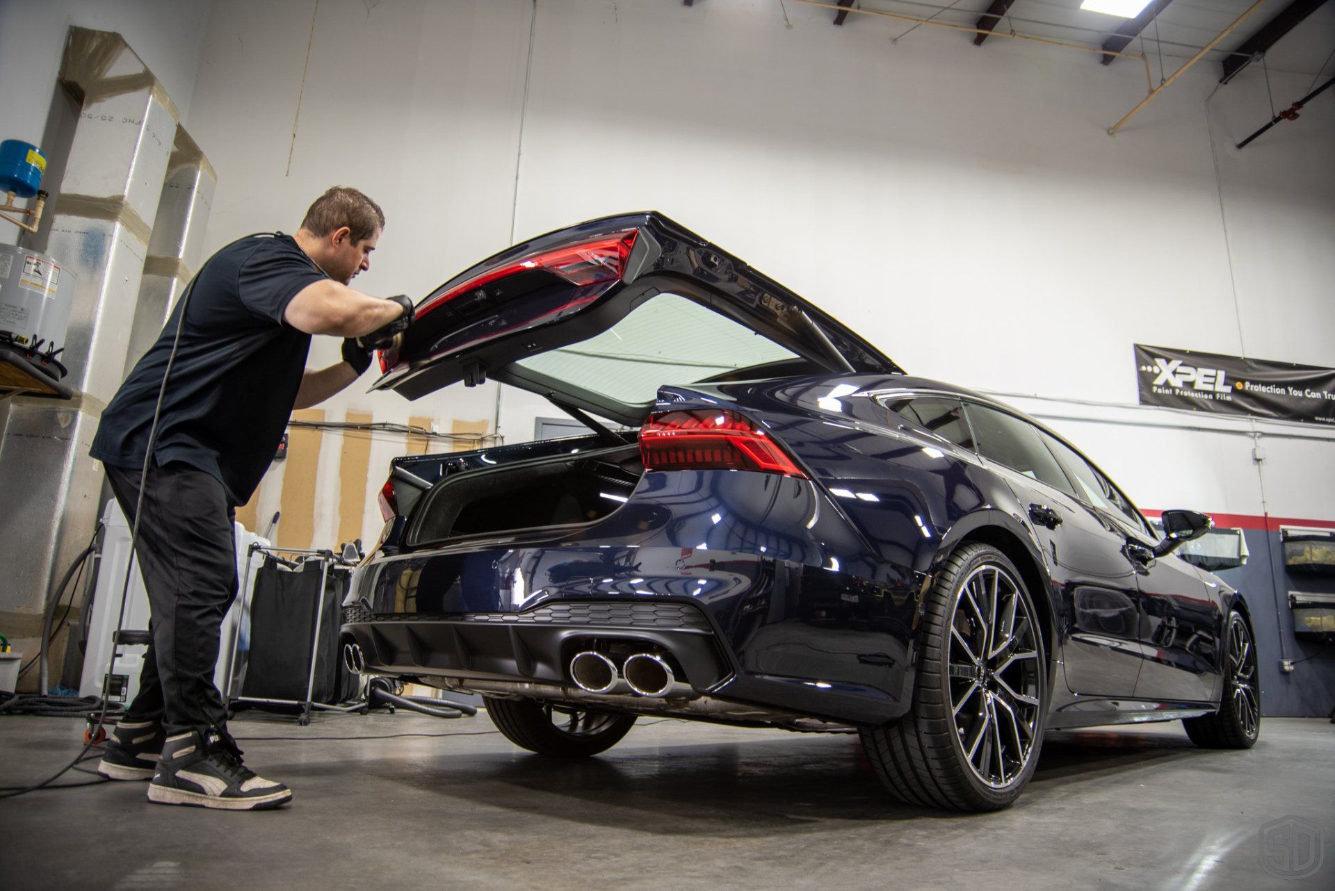 Audi S7 Preparation Detail, Paint Correction, Modesta Primer, Front Paint Protection Film, Modesta Leather Protection System, Modesta BC-06 Wheel Coating, Modesta Glass Coating trunk installation view Orlando Florida