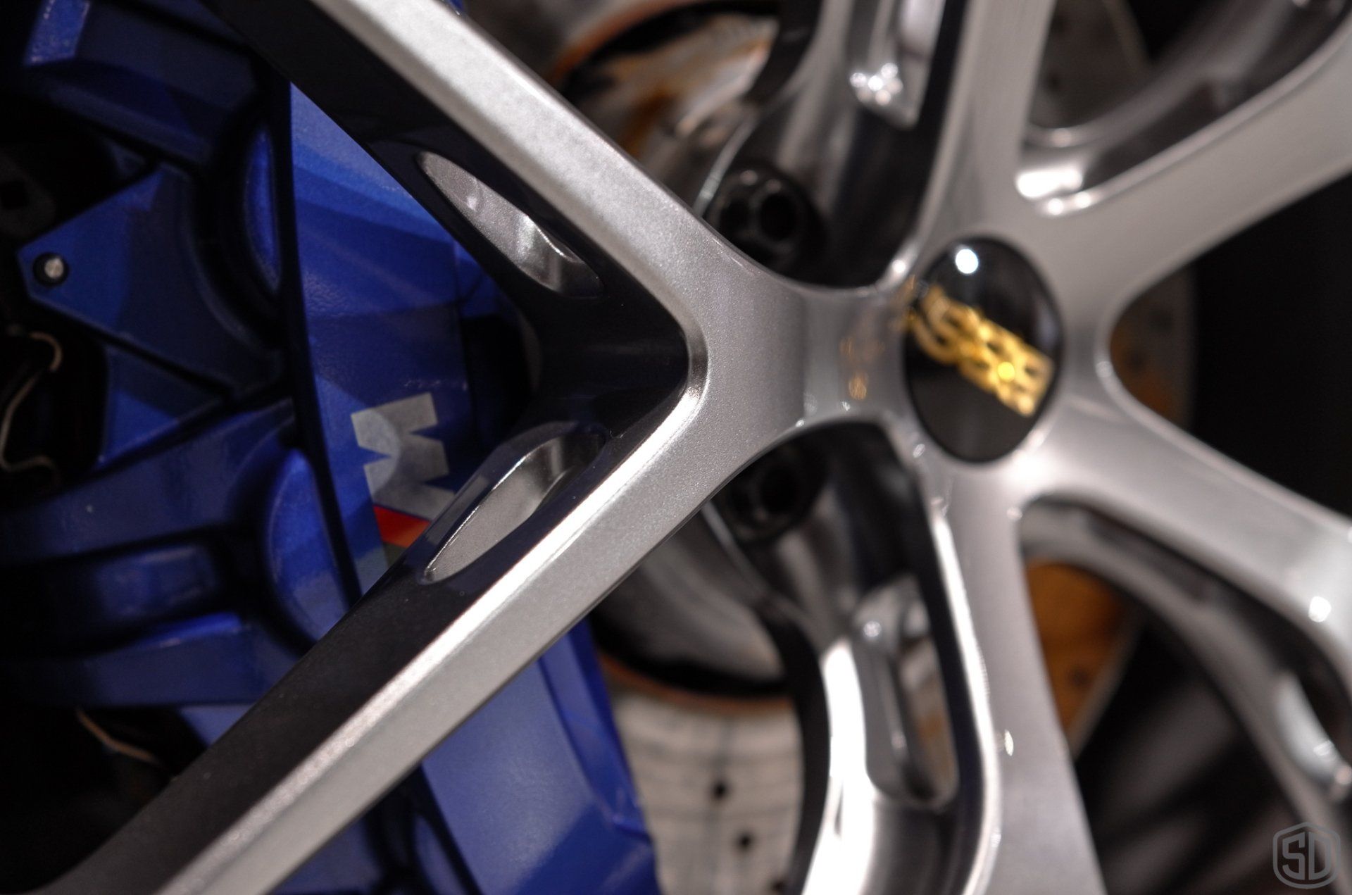 BMW M5 wheel caliiper detail modesta glass coating orlando FL