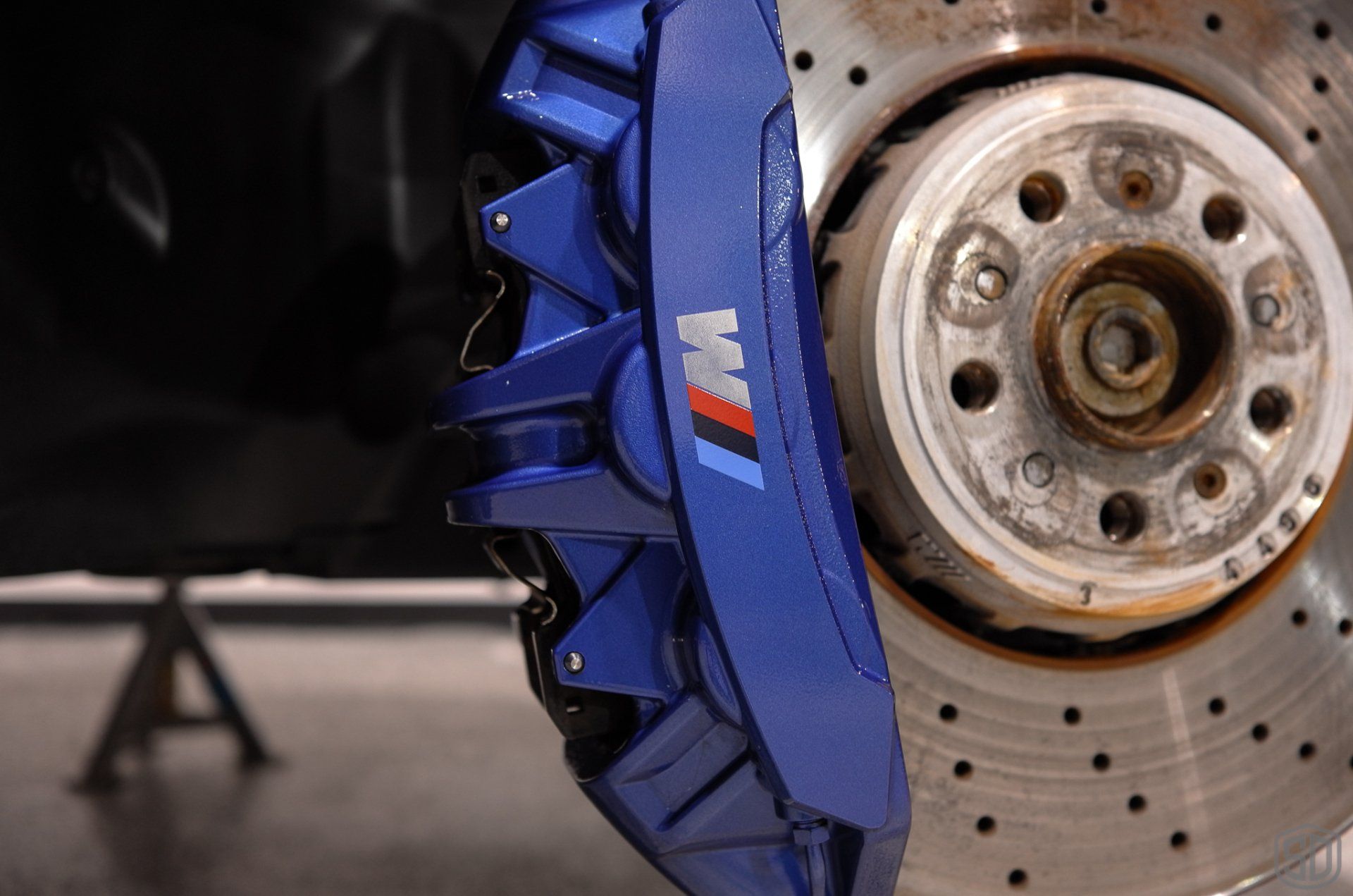 BMW M5 wheel caliper detail modesta glass coating orlando florida