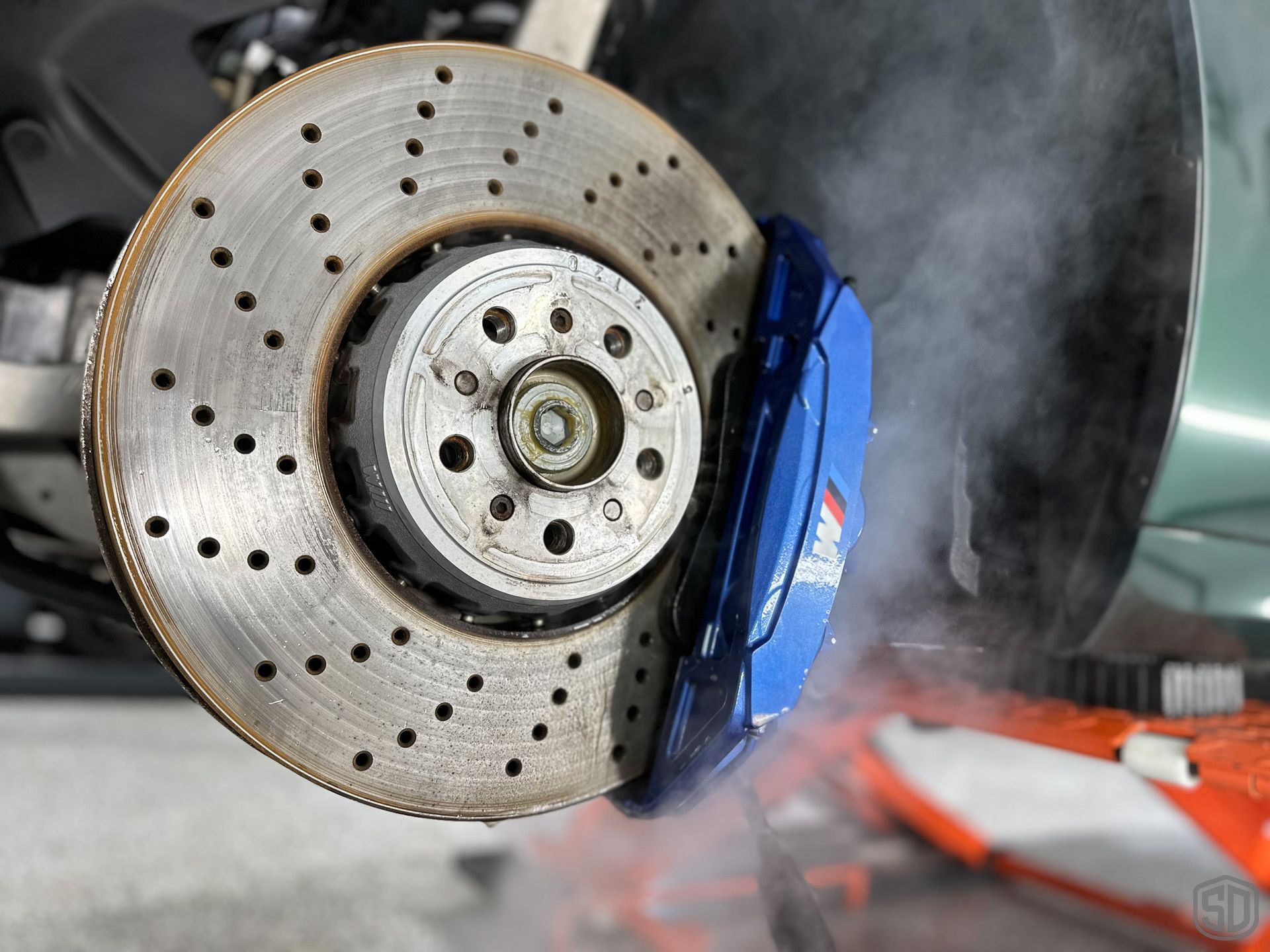 BMW M8 Modesta Coating BC-06 Glass Coating on the Brakes and Calipers close up on calipers Florida