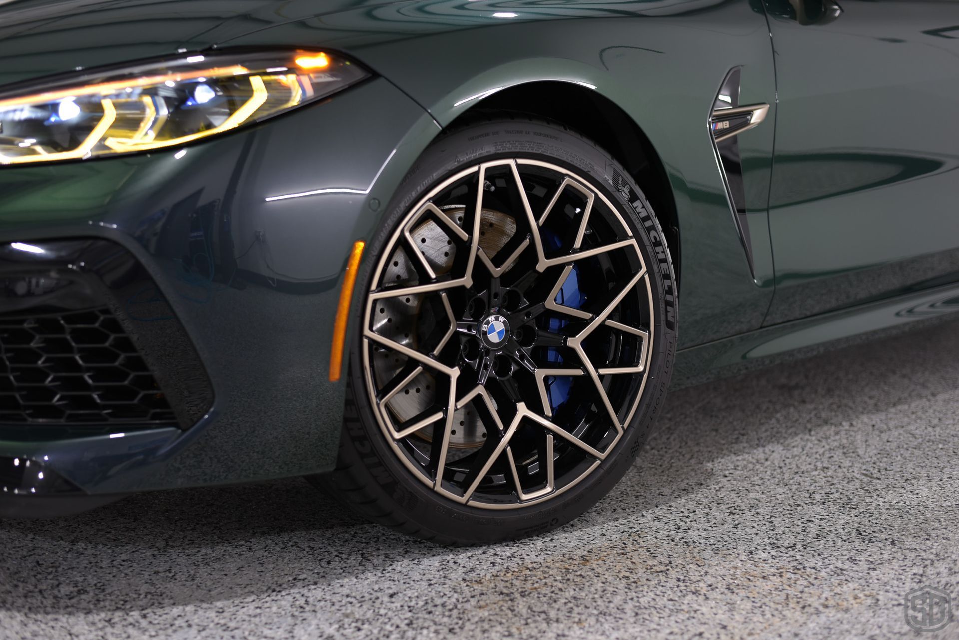 BMW M8 Modesta Coating BC-06 Glass Coating on the Brakes and Calipers front wheel close up FL