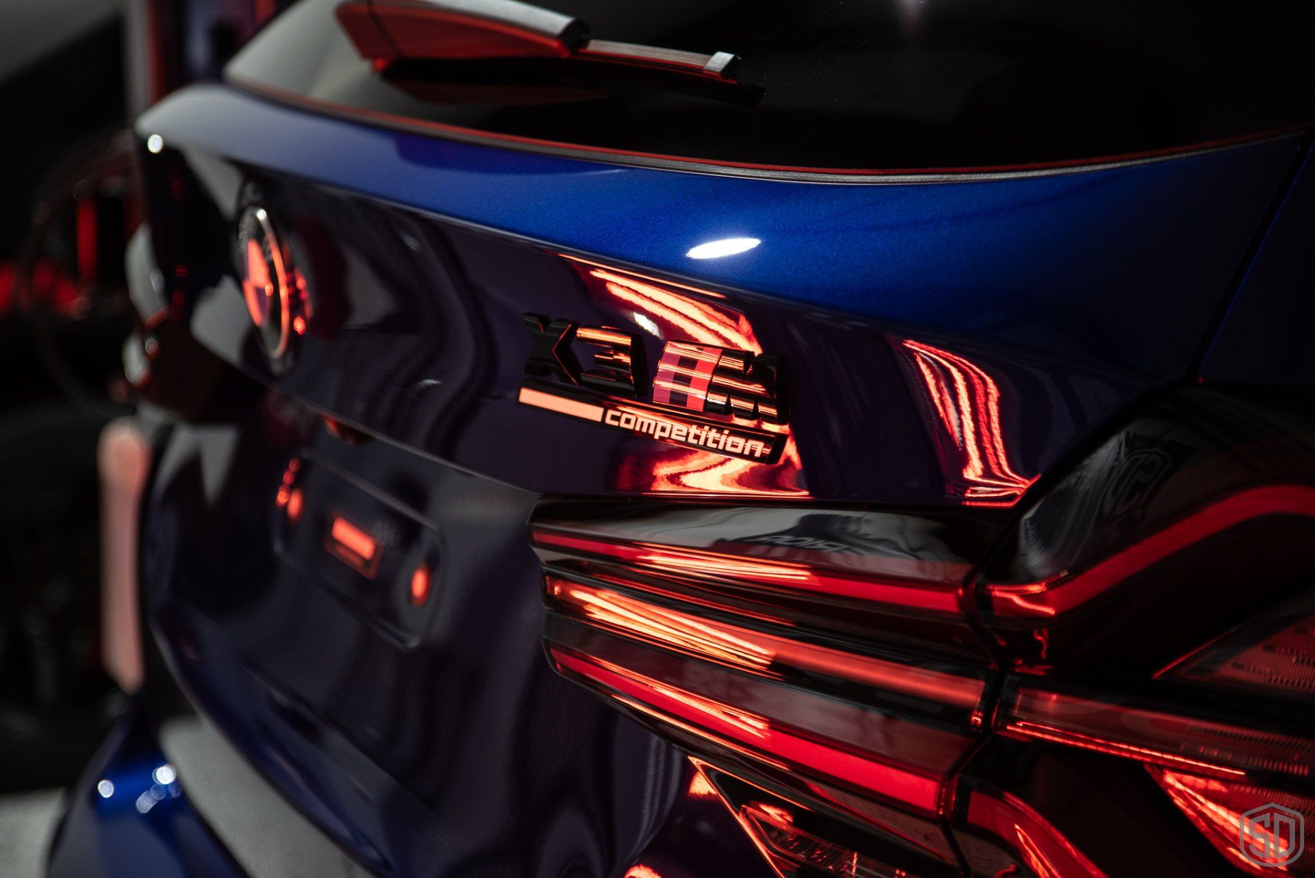 BMW X3M Competition - Modesta Level 2 Paint Correction + P0-1a coating + BC04 Nano Titanium Glass coating rear emblem detail Florida