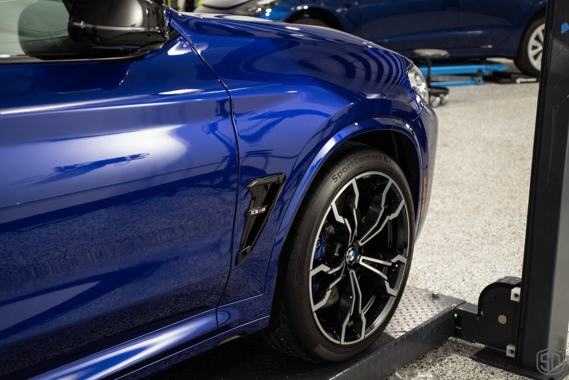 BMW X3M Competition - Modesta Level 2 Paint Correction + P0-1a coating + BC04 Nano Titanium Glass coating side view Orlando FL