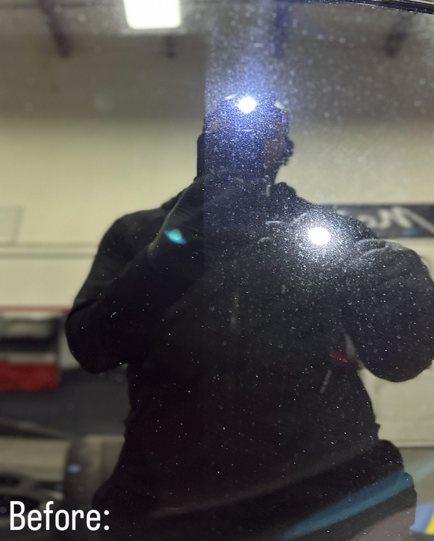 A man taking a picture of himself in a mirror with the caption before