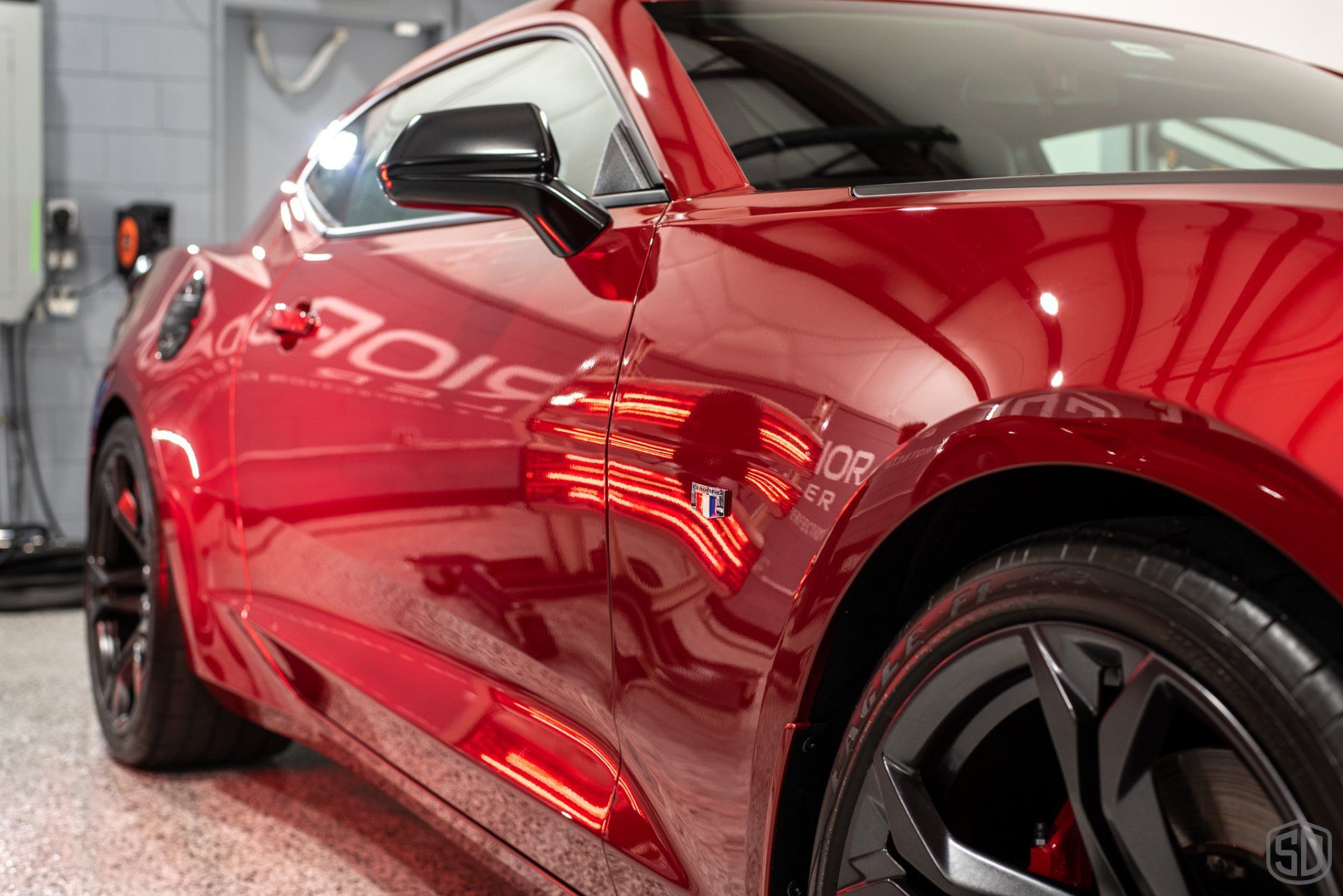 Chevrolet Camaro SS 1LE Detailing, Level 3 Full Correction, Modesta Primer Polish, Wheel & Caliper Protection, Ceramic Coating, PPF to Front Bumper close up of side panel Orlando