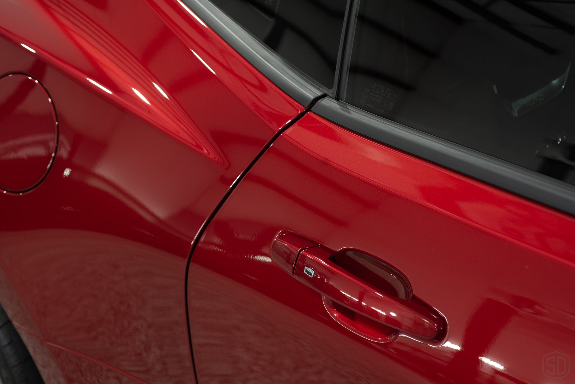 Chevrolet Camaro ZL1 Modesta Ceramic Coating on paint, wheels, and brake calipers and Xpel Paint Protection Film to Front Bumper and Rear Splash side door close up Orlando