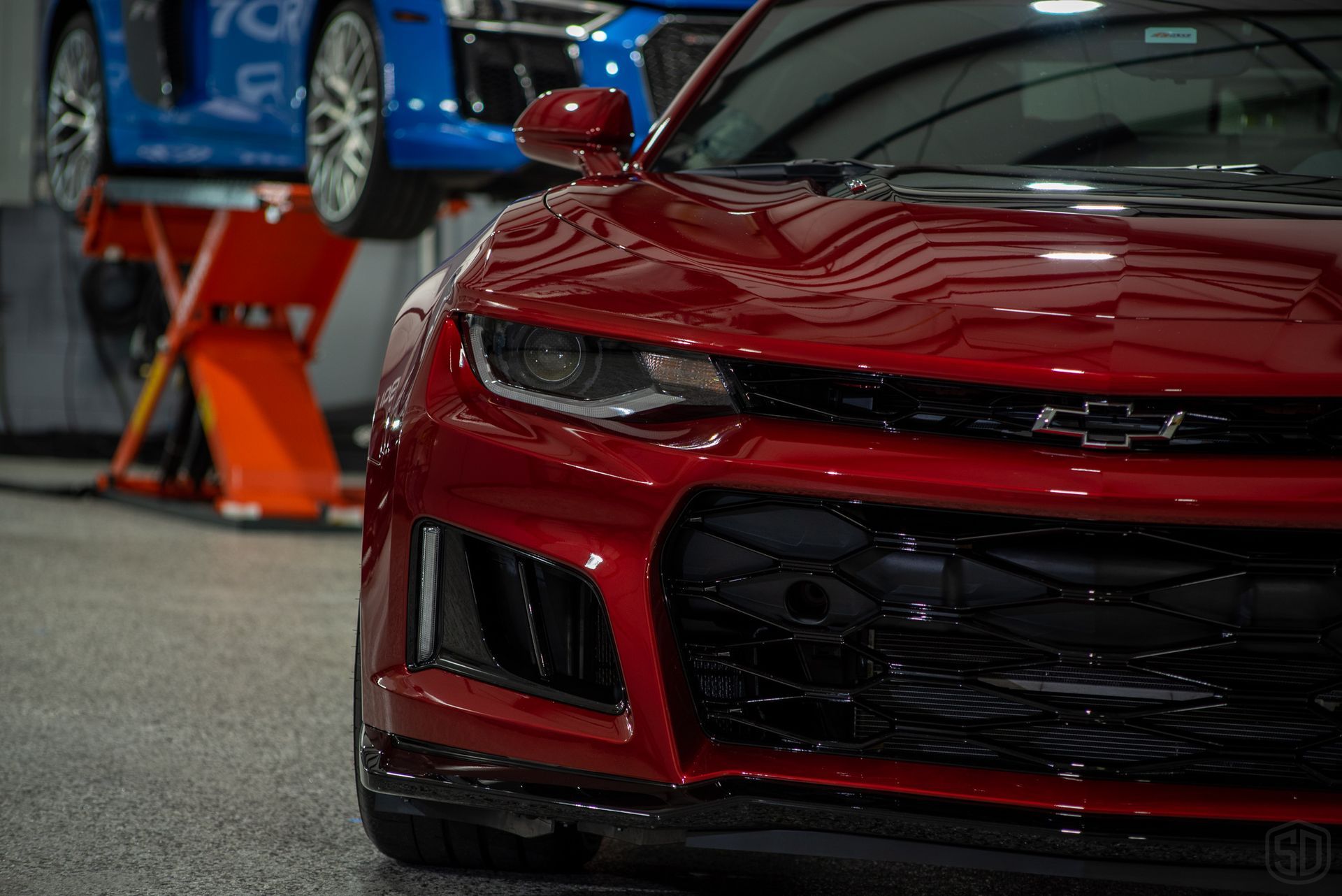 Chevrolet Camaro ZL1 Modesta Ceramic Coating on paint, wheels, and brake calipers and Xpel Paint Protection Film to Front Bumper and Rear Splash front grill close up Orlando USA