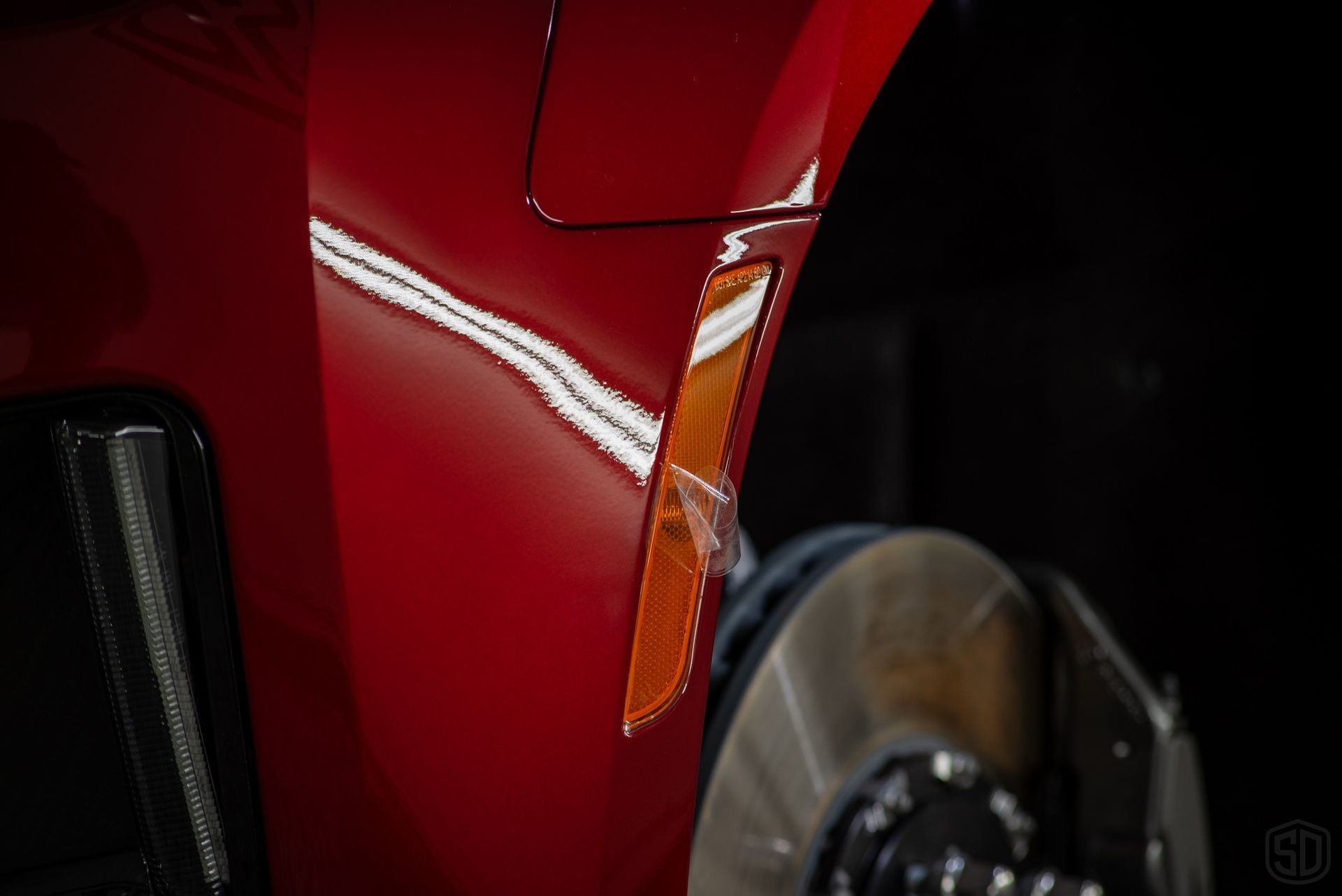 Chevrolet Camaro ZL1 Modesta Ceramic Coating on paint, wheels, and brake calipers and Xpel Paint Protection Film to Front Bumper and Rear Splash refelector close up FL USA