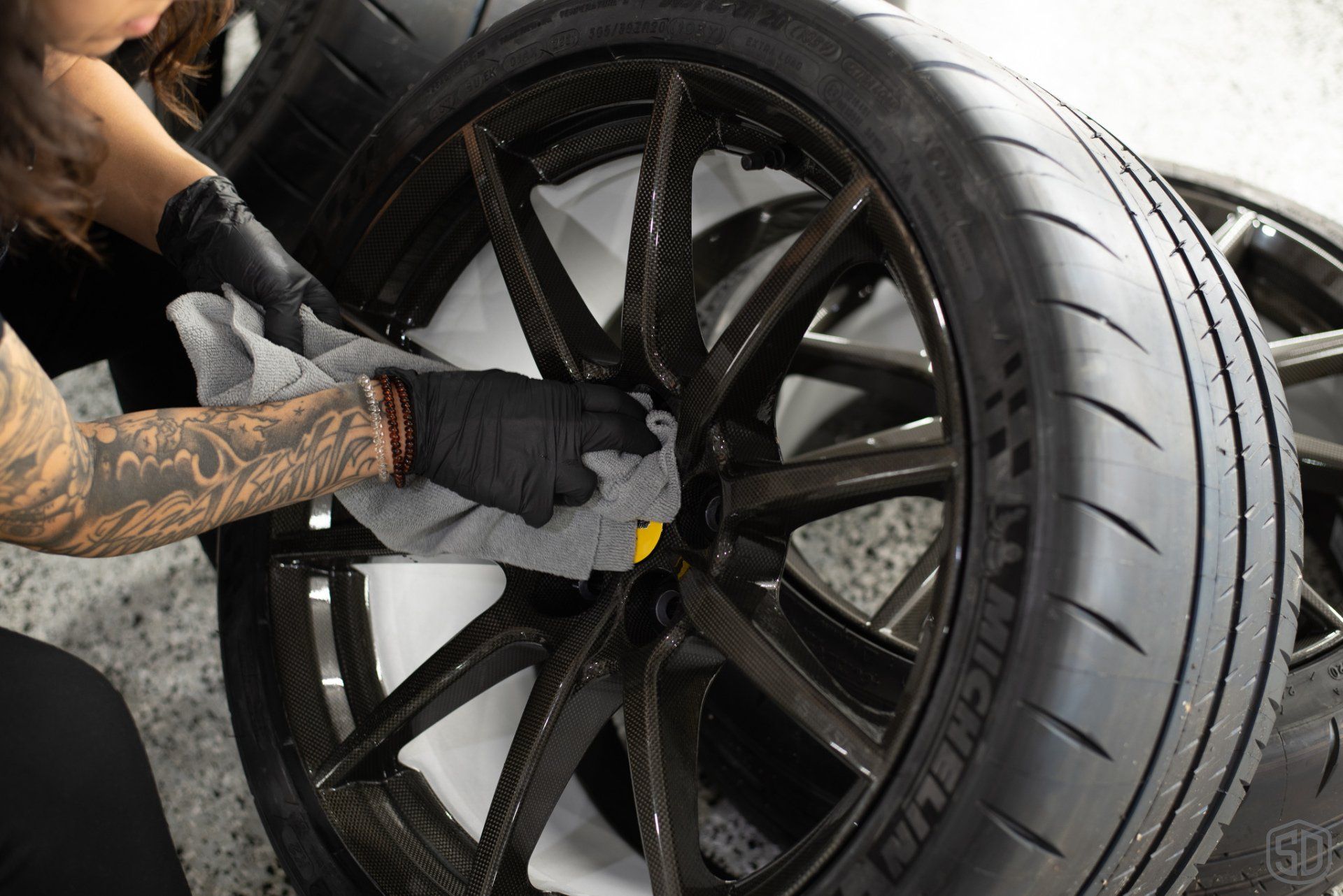 Ferrari F8 Tributo brakes and carbon fiber wheels now protected with Modesta BC-06 installation shot Orlando Florida