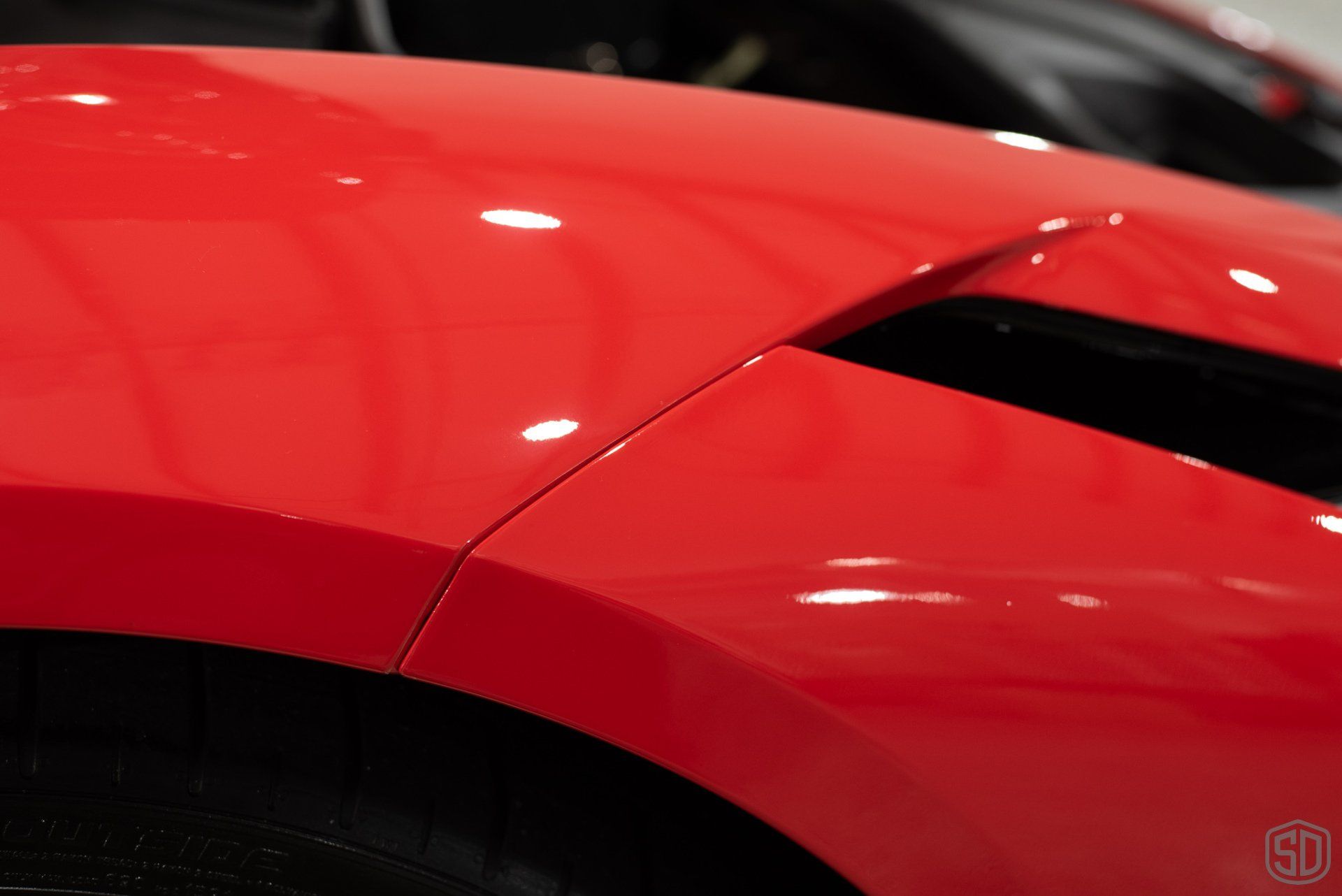 Ferrari F8 Tributo Full body PPF, Dynoflex Windshield Protection Film, Modesta BC-06 Wheel Coating, Modesta BC-05 Advanced Water-Repellent Glass Coating, Modesta Leather Protection System side panel view Orlando Florida