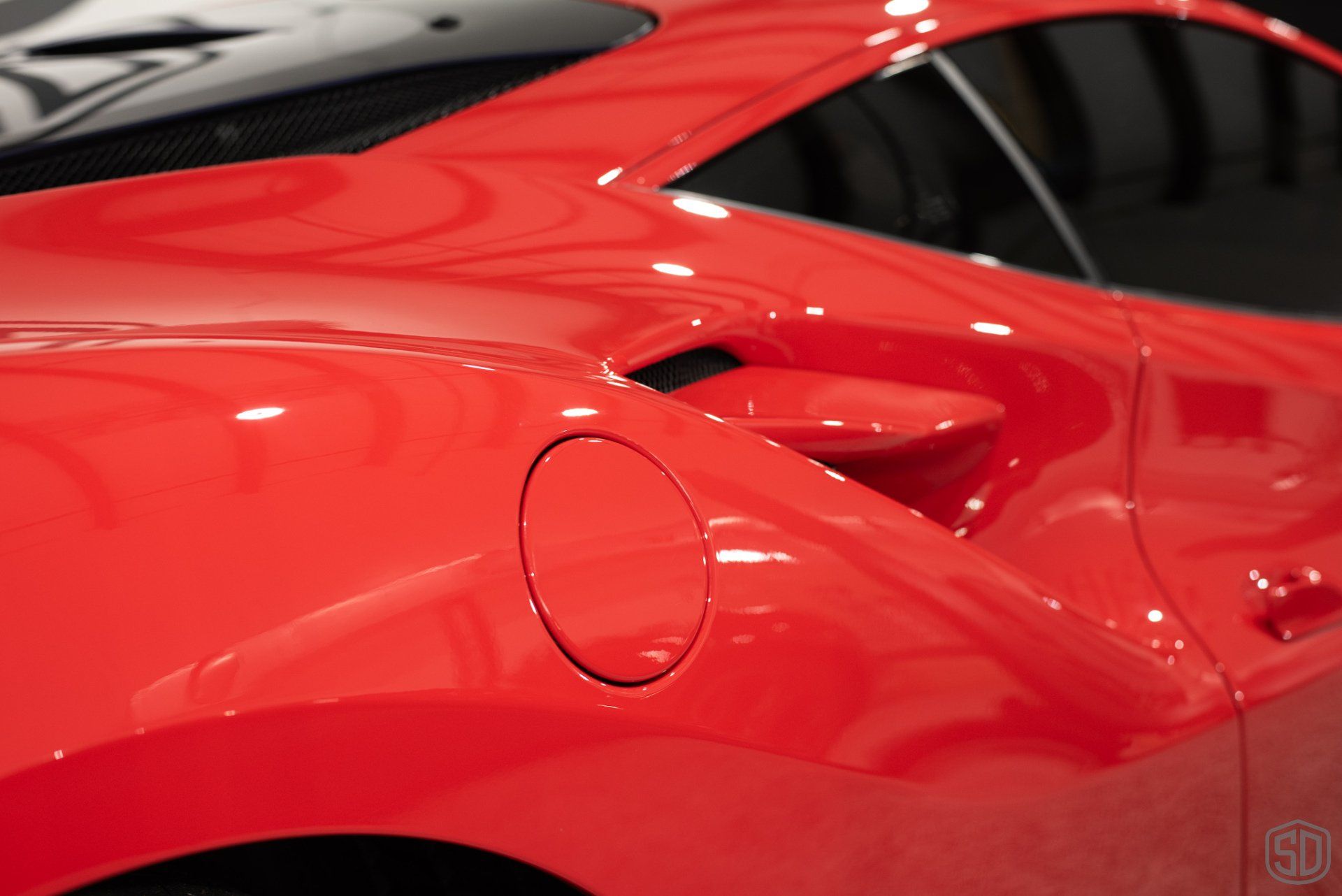 Ferrari F8 Tributo Full body PPF, Dynoflex Windshield Protection Film, Modesta BC-06 Wheel Coating, Modesta BC-05 Advanced Water-Repellent Glass Coating, Modesta Leather Protection System side panel close upOrlando