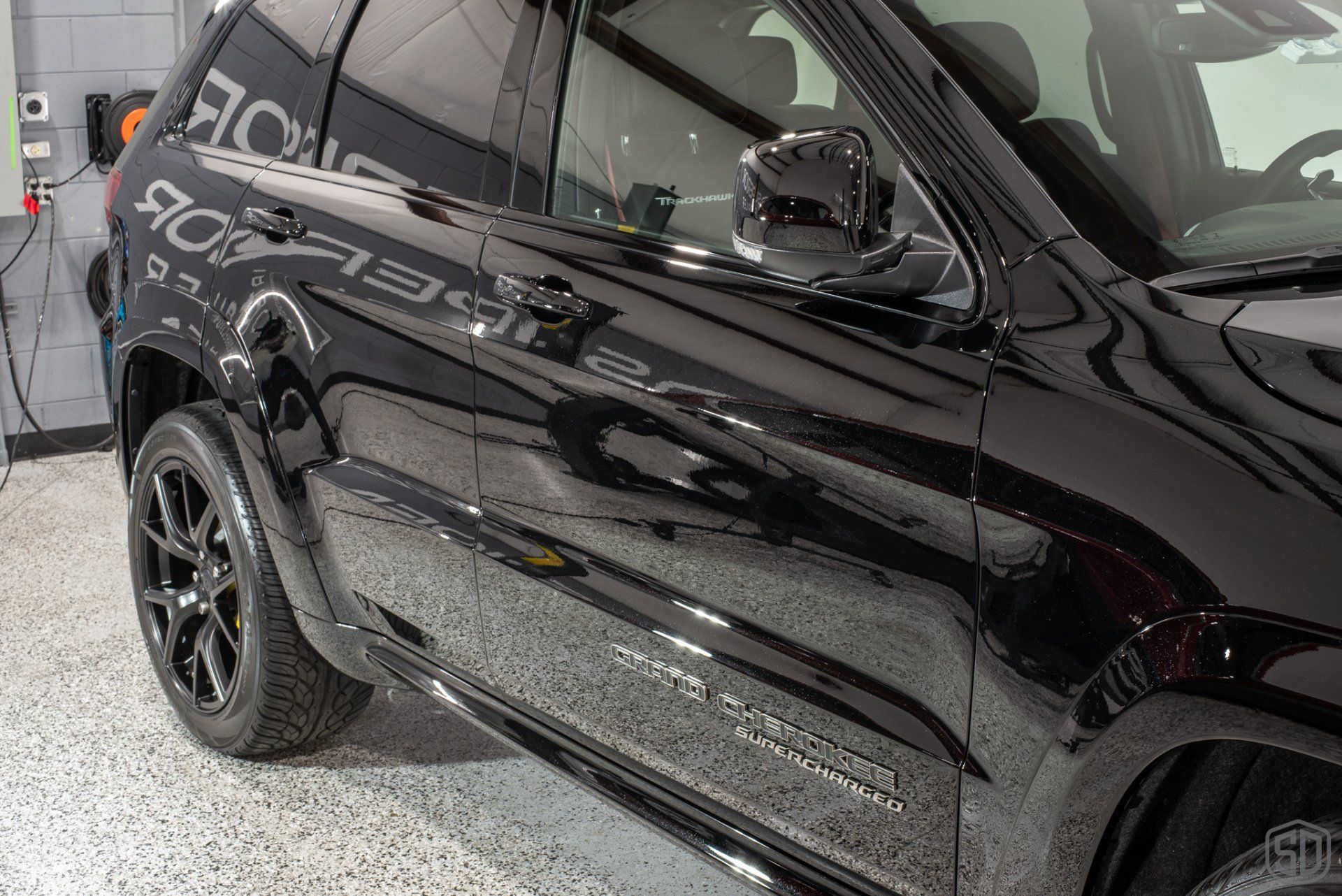 Jeep Grand Cherokee Trackhawk High Gloss Correction/ Polish, Exterior Detail and Modesta Coatings side door close up Florida